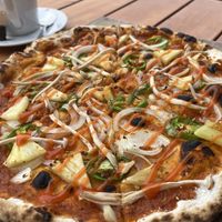 Pineapple & veggie pizza without cheese   at Green Restaurant in Vang Vieng