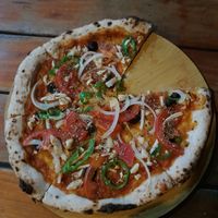 Garden Veggie pizza without cheese at Green Restaurant in Vang Vieng
