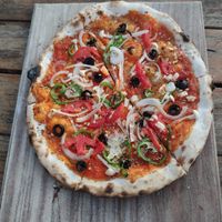 Garden veg pizza with no cheese at Green Restaurant in Vang Vieng