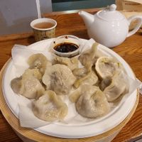 Pumpkin leek and wood ear mushroom dumplings with spicy soy sauce at Parnik Chmielna in Warsaw
