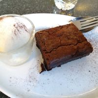 Vegan Green and blacks brownie and ice cream! at Greens Cafe in Grasmere