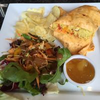 Spicy humous wrap with salad, dip and crisps at Greens Cafe in Grasmere