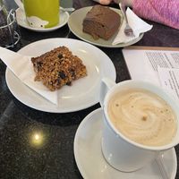 Oat milk hot chocolate, sticky ginger cake, oat latte and fruit flapjack   at Greens Cafe in Grasmere