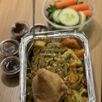 Mixed veggie curry over rice, side salad, veggie samosas with tamarind dip.  at Mela Bangladeshi Cuisine in Pullman