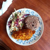 Carribean corn cob with rice/peas and coleslaw at The Jerk Spot in Pai