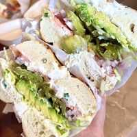 Plain bagel with vegan scallion cream cheese and ALL the veggies 🤤  at Shug's Bagels in Dallas