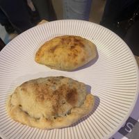 Roasted corn, poblano, Maza and cashew cheese, empanada and mushroom spinach empanada  at Cafe' Xocolatl in Sacramento