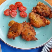 Fried tomato balls with a side of santorini tomatoes instead of tzatziki at La Scala in Santorini