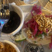 Vegan Coliflor Frita (tempura fried cauliflower, cashew crema, pickled cabbage, peanut salsa macha, vegan queso fresco)  at Xaco Taco in Providence