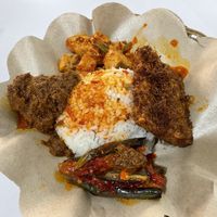 with rendang  at Kehidupan Tidak Pernah Berakhir in Bandung