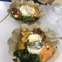 Already started eating (2x satay and 2x tricken nuggets are not here) 60k rupiah  at Kehidupan Tidak Pernah Berakhir in Bandung