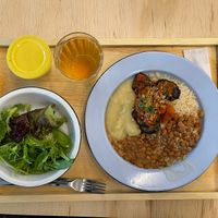 Vegan dish: rice, beans, Aubergine, potato purée, salad  at Cozinha Ocupação 9 de Julho in Sao Paulo