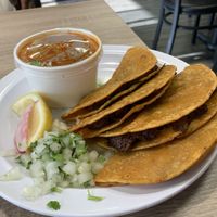 Birria tacos with consommé   at Viva Vegan Diner in Upland