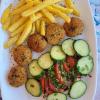 Falafel with frieds and salad at Taverna Perissa in Santorini