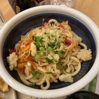 Kimchi Yaki Udon (with added spring onion and tempura pieces)  at Marugame Udon in Bromley