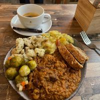 Vegan Chilli with bread and salads. The salads are potato salad, cauliflower and Brussels sprouts. Also a double espresso.  at Ivi's Veggie & Coffee Dreams in Bamberg