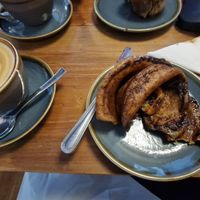 Oat latte and Cinnamon Bun at King Alfred's Kitchen in Shaftesbury