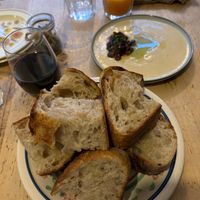 Remedy bread and hummus small plate. forgot to photograph the leek dish which was amazing.  at Remedy Coffee Shop in York