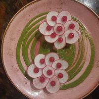 The beet and radish patties were not for me but the green sauce made the dish work. at Restaurant XO in Honolulu