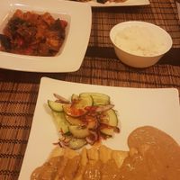 Fried tofu with peanut sauce, eggplant and tofu with noodles and pad thai at Horai in Krakow