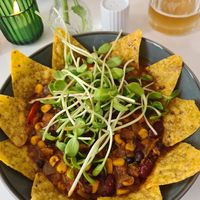 Bean Chili with sunflower sprouts and sunflower nachos at Café Glass in Toender