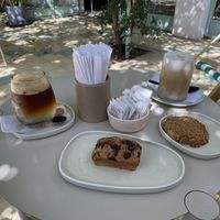Espresso Tonic, banana choco brownie, oat cookie and ice cafe classic with almond milk  at Paloma Bakery House in Mendoza
