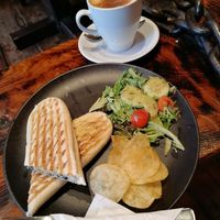 Vegan cheese and garlic mushroom panini and chai latte at Coffee With Art in Bedford