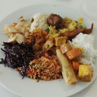 Selection of cold and warm dishes at Loving Hut in Helsinki