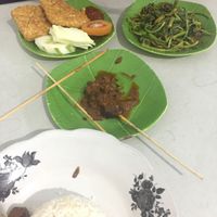 tempeh, satay, and greens served with rice at Ijo Daun Vegan in Denpasar