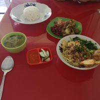 Dish in the middle is just ok but noodles dish didn't taste good cause of the sauce at Ijo Daun Vegan in Denpasar