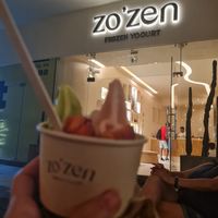 strawberry and mint-chocolate frozen yogurt with topings at Zo'Zen Yogurt in Playa Del Carmen