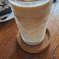 Iced latte with oat milk. Good! at Mana Retreat in 