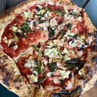 Vegan pizza   at Millennium Garden in Tirana