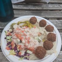 Baba, hummus, falafel salad plate at Rami's in Brookline