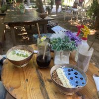 The garden and our smoothies, smoothie bowls & coffees   at YAAB Vegan Kitchen in Puerto Escondido