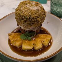 'Malva' - Chai ice cream with pistachio crumbs, over a pudding and caramel sauce, and a grilled pineapple slice. NEXT LEVEL! at Ver De in El Nido