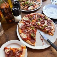 Vegan GF salami pizza and vegan Gf Capriccosa pizza  at Pizza Bertoldi - Jakubská in Prague