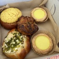 Pineapple Bun, Eggless Tarts, Sesame Kouign Amann, and Green Onion Bun ❤️  at Tai Zhan Bakery in Saratoga