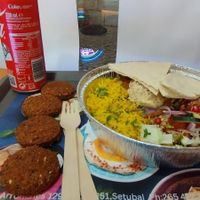 Simple but tasty and abundant. Plate + side of falafel + coke, less than 15€. It's good to found vegan food in such small town. at Hummus Junction in Setubal