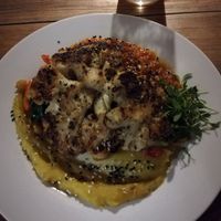 Baked coliflor on different salsas, chickpeas and veggies at Maxan in Antigua