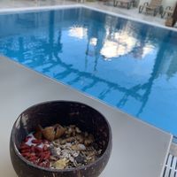 Breakfast by the pool  at GOJI Vegan Hotel in Rhodes