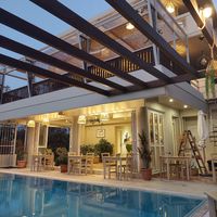 Dining and breakfast area along the pool at GOJI Vegan Hotel in Rhodes