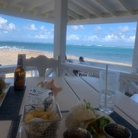 Amazing view from open air seating.  On tip of the island, waves were coming in from 2 directions. at Arthur's Restaurant & Bar in Dieppe Bay Town