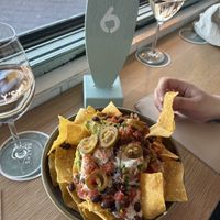 vegan nachos — half off during happy hour  at Salty's in Bondi Beach