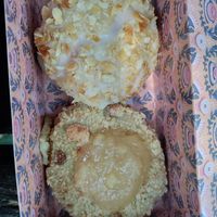 Vanilla custard filled with almonds on top and apple crumble. So good at Brammibal's Donuts - Schanzenviertel in Hamburg