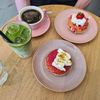 Americano, iced matcha latte, and two donuts. at Brammibal's Donuts - Schanzenviertel in Hamburg
