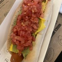 Pancho con palta, tomate y queso vegano  at Dominó in Santiago