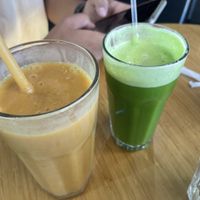 Mango smoothie and green juice  at Newport Market and Deli in Cape Town