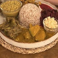 vegan rice with different curriess  at Hey Mama in Mirissa