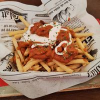 Vegan Chicken Nuggets with Peanuts Sauce and fries at Cafe Extrablatt - Am Marstall in Hannover
